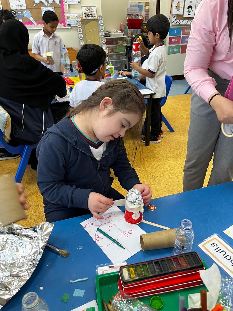 Melia in arts and crafts class, which is crucial for young children to develop their sense of creativity and utilise their five senses freely. Picture taken by Melia’s teacher in November 2024.