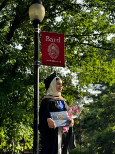 Amina, pictured at her graduation after obtaining her degree