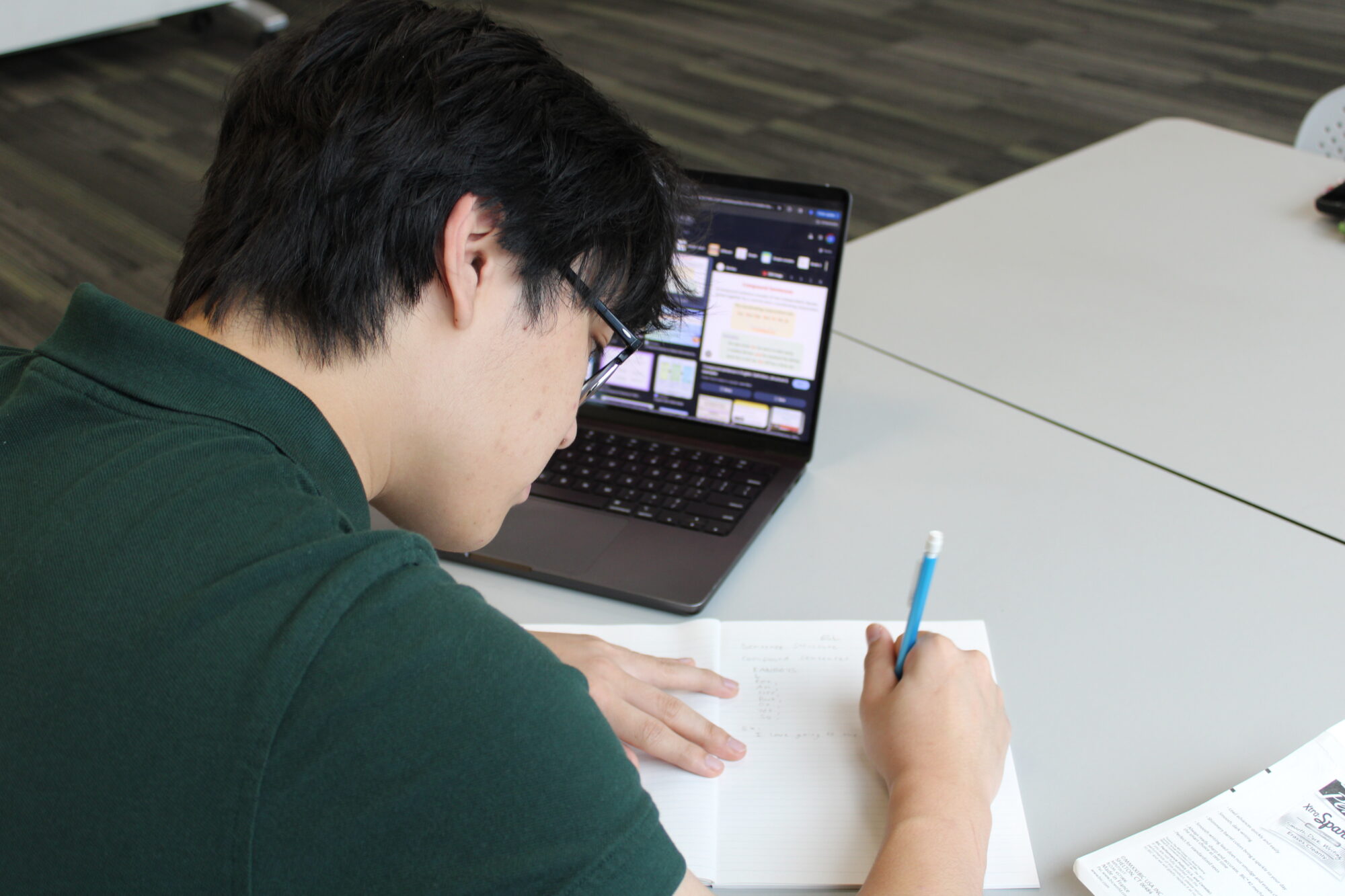 Justin Nguyen, a volunteer tutor with Birmingham Jumpstart in Alabama, creates personalised lessons for students